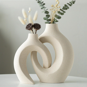 Two-piece hollow shaped ceramic vase pack, streamlined northern plain book-inspired design, cream tone ornaments for living room shelves, hallways and coffee table displays