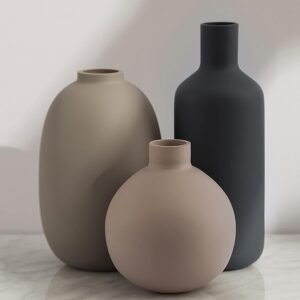 Three-piece neutral tone ceramic display jars, soft countryside contemporary style, compact ornaments for tabletops, lounge spaces, shelves and entry styling