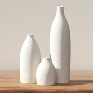 Three-piece cream matte clay ceramic vase set, plain northern contemporary design, decorative holders for tabletops, fireplace mantels, hall consoles and dining island focal layouts